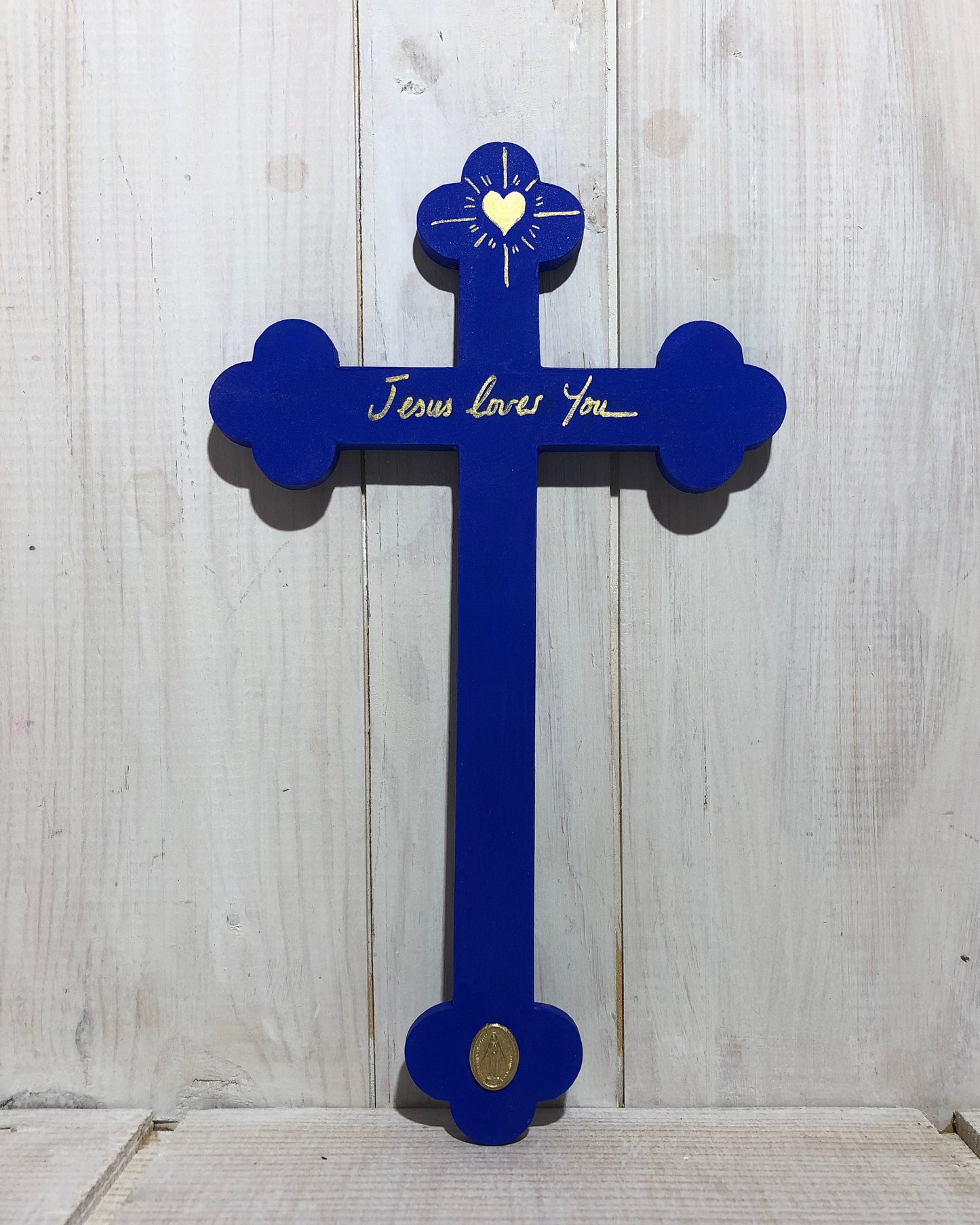 Crucifix M sapristi store bleu Klein