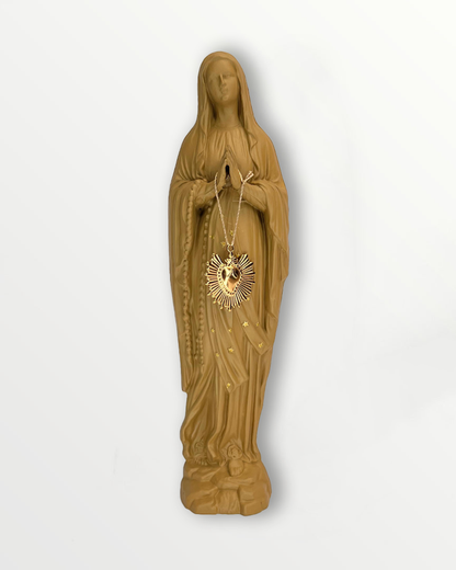 Statuette de la Vierge ex-voto